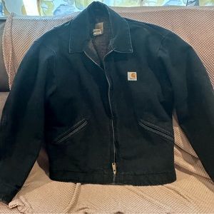 Carhartt black distressed canvas, flannel lined jacket. Medium made in 2007